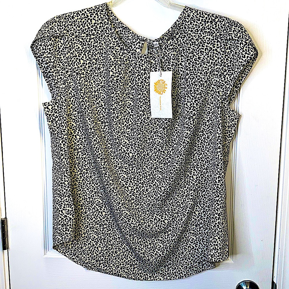 Adorable Leopard Blouse, great for casual wear, or to match up w/ business suit